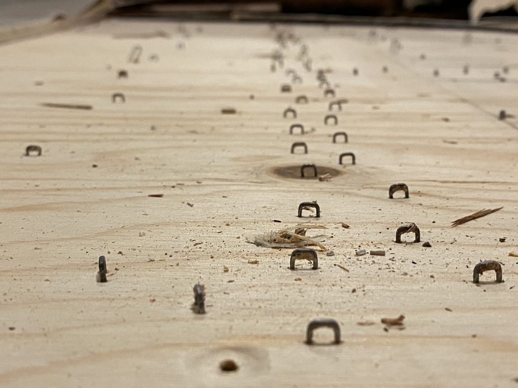 Tacks... thousands of tacks...